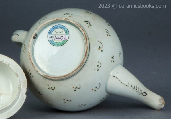 Bachelor or child prattware teapot with flowers. c.1800-1820. AP/1402. Base.