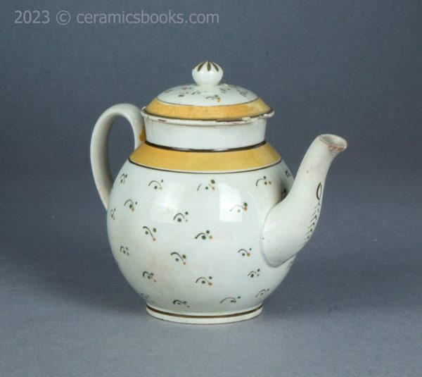 Bachelor or child prattware teapot with flowers. c.1800-1820. AP/1402. Front reverse.