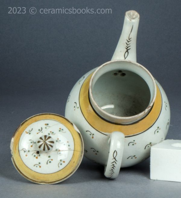 Bachelor or child prattware teapot with flowers. c.1800-1820. AP/1402. Inside.