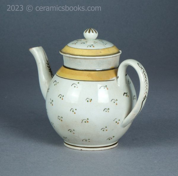Bachelor or child prattware teapot with flowers. c.1800-1820. AP/1402. Back obverse.