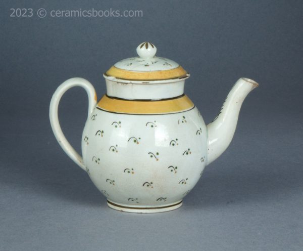 Bachelor or child prattware teapot with flowers. c.1800-1820. AP/1402. Reverse.