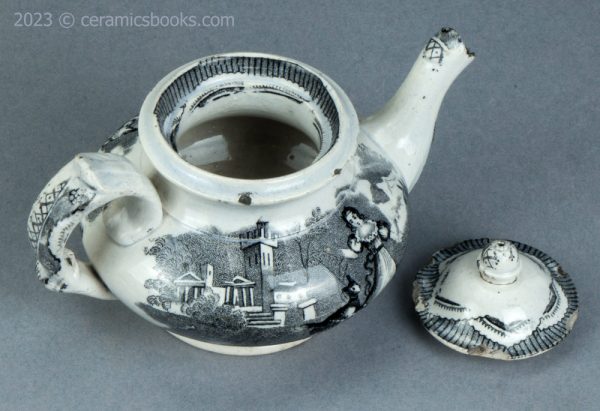 Child's size black transfer printed teapot. Possibly Godwin. c.1835-1845. AP/1563. Above.