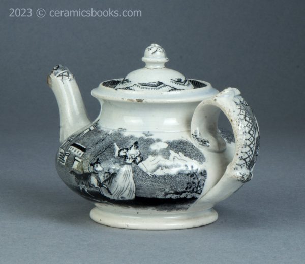 Child's size black transfer printed teapot. Possibly Godwin. c.1835-1845. AP/1563. Back obverse.