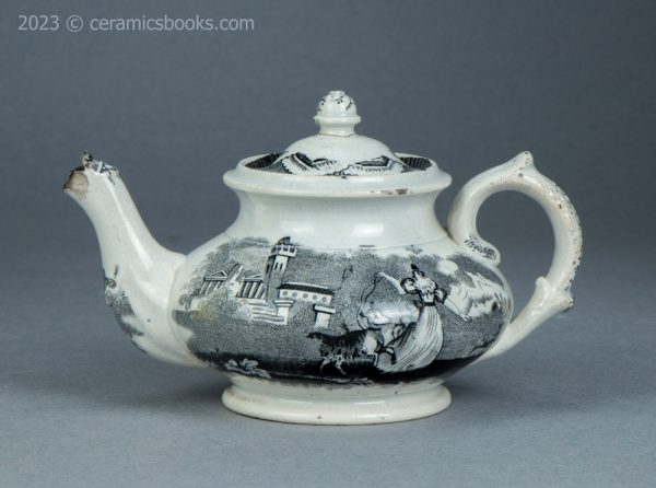 Child's size black transfer printed teapot. Possibly Godwin. c.1835-1845. AP/1563. Obverse.