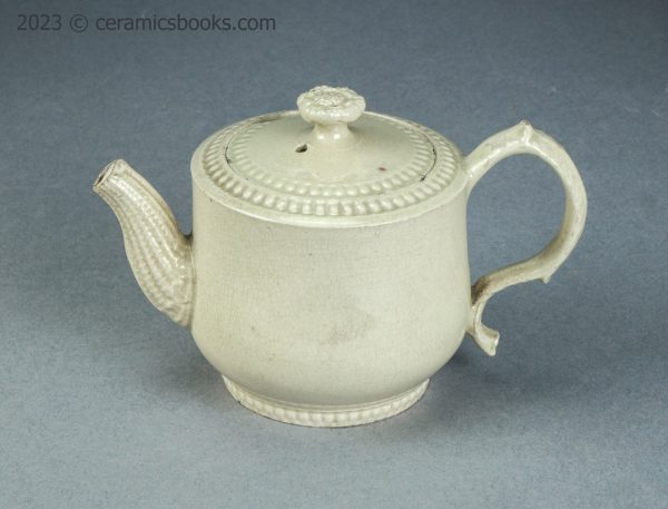 Small creamware teapot with rouletting. Staffordshire. c.1765-1785. AP/1564. Obverse above.