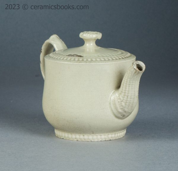 Small creamware teapot with rouletting. Staffordshire. c.1765-1785. AP/1564. Front spout.