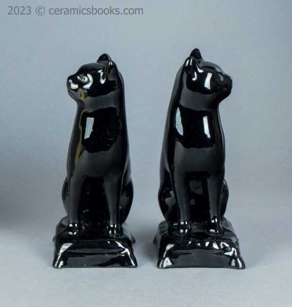 Pair of Jackfield type black cats. c.1865-1885. AP/1653/1145. Front.