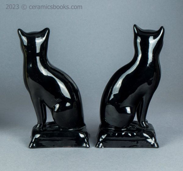 Pair of Jackfield type black cats. c.1865-1885. AP/1653/1145. Reverse.