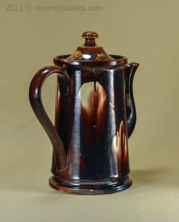 Two-tone treacleware (Rockingham glaze) coffee pot. Rare 'metal' shape. c.1840-1870. AP/762. Back.