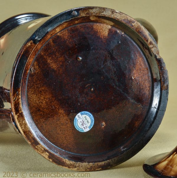 Two-tone treacleware (Rockingham glaze) coffee pot. Rare 'metal' shape. c.1840-1870. AP/762. Base.