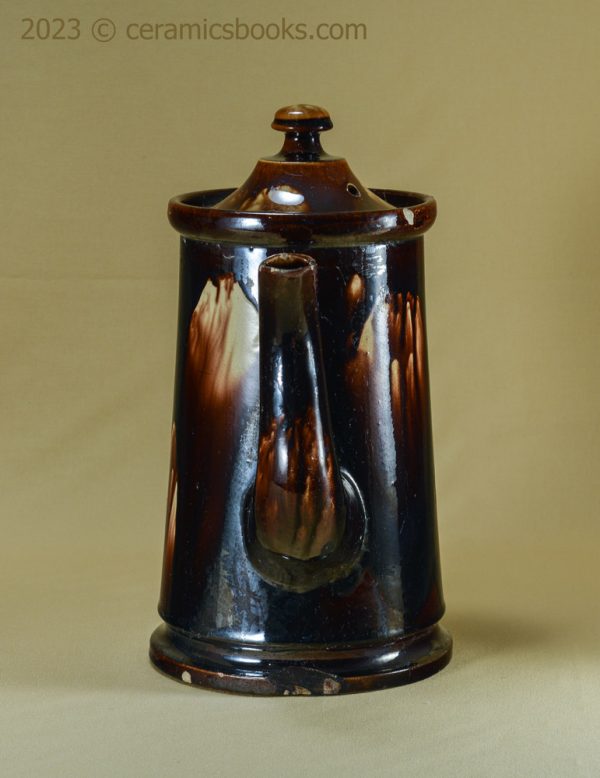 Two-tone treacleware (Rockingham glaze) coffee pot. Rare 'metal' shape. c.1840-1870. AP/762. Front.