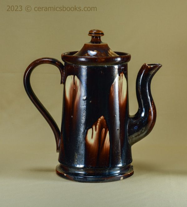 Two-tone treacleware (Rockingham glaze) coffee pot. Rare 'metal' shape. c.1840-1870. AP/762. Reverse.