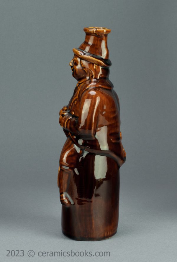 Treacleware Old Tom spirit flask. c.1840-1865. AP/952. Left side.