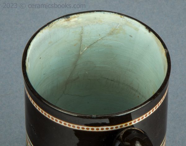 Redware 'mochaware' tankard with rouletting. c.1810-1830. AP/1046. Inside.