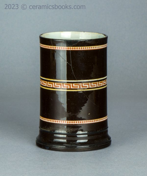 Redware 'mochaware' tankard with rouletting. c.1810-1830. AP/1046. Front.