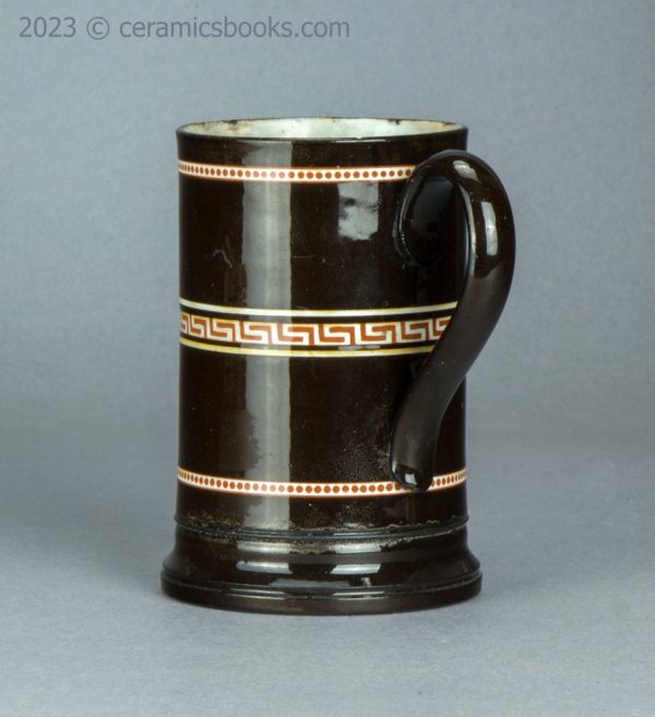 Redware 'mochaware' tankard with rouletting. c.1810-1830. AP/1046. Obverse back.
