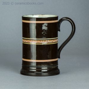 Redware 'mochaware' tankard with rouletting. c.1810-1830. AP/1046. Obverse.