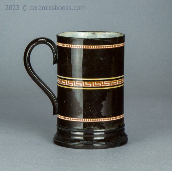 Redware 'mochaware' tankard with rouletting. c.1810-1830. AP/1046. Reverse.