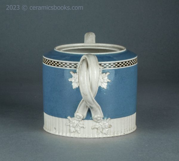 Neale & Co. blue slip 'mochaware' teapot. c.1784-1795. AP/1200. Back.