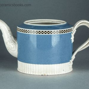 Neale & Co. blue slip 'mochaware' teapot. c.1784-1795. AP/1200. Obverse.