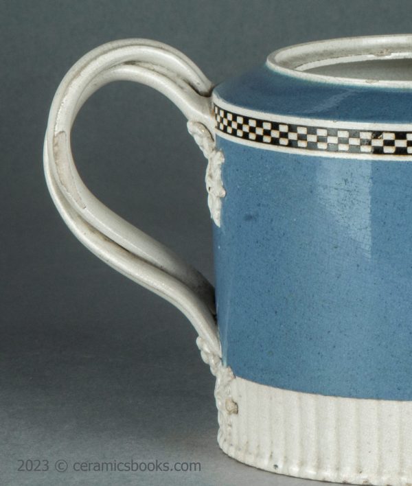 Neale & Co. blue slip 'mochaware' teapot. c.1784-1795. AP/1200. Handle chip.