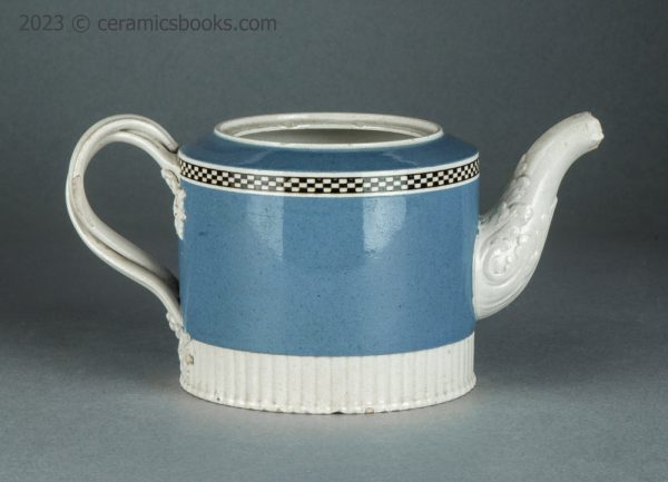 Neale & Co. blue slip 'mochaware' teapot. c.1784-1795. AP/1200. Reverse.
