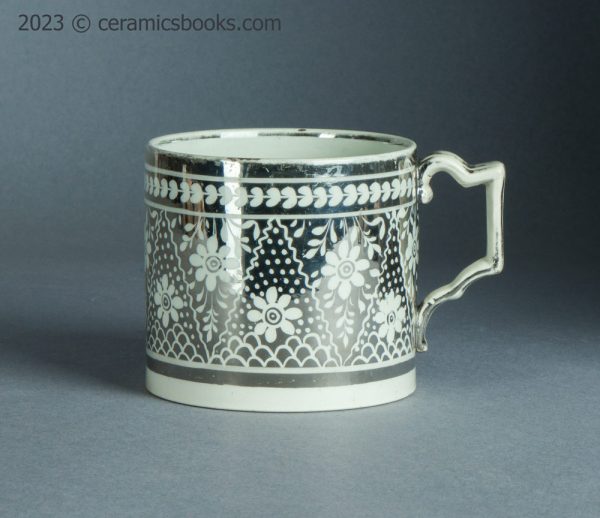Silver resist lustreware mug with flowers. c.1810-1820. AP/1399. Obverse.