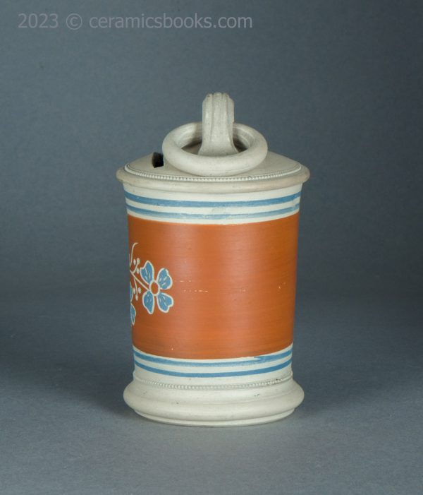 Unglazed banded ware / mochaware moneybox with sgraffito. c.1840-1900. AP/1409. Obverse.