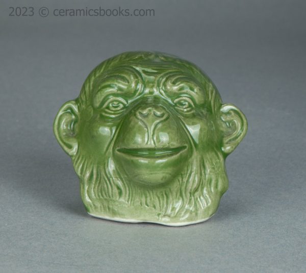 Green porcelainous monkey head moneybox. Austrian. c.1890-1917. AP/1413. Front.