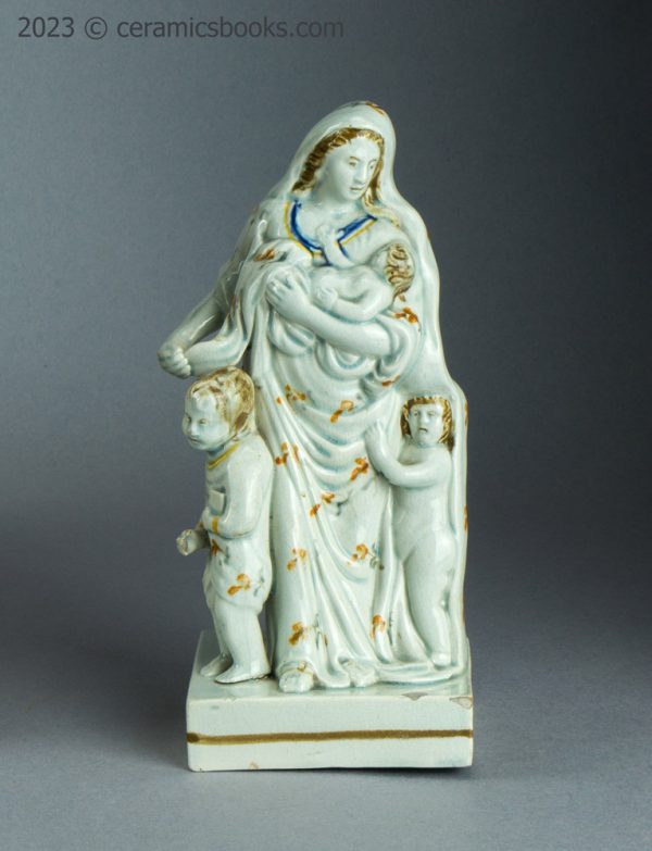 Prattware figure of Charity. Staffordshire. c.1790-1810. AP/1632. Front without prop.