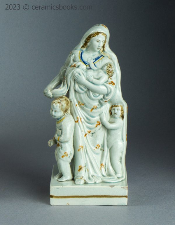 Prattware figure of Charity. Staffordshire. c.1790-1810. AP/1632. Front with prop.