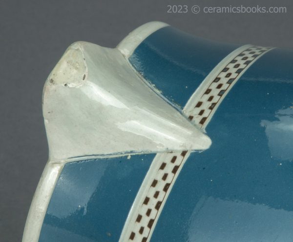 Baluster 'mochaware' pearlware blue slip jug. c.1790-1800. AP/1715. Spout outside.