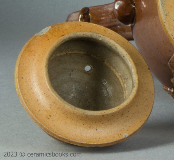 Salt-glazed stoneware coffeepot "J & N Houldsworth 1839". AP/997. Inside lid.