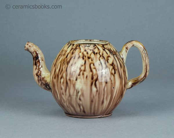 Creamware 'Whieldon' type teapot attrinuted to Cockpit Hill, Derby. c.1765-1770. AP/1234. Obverse.