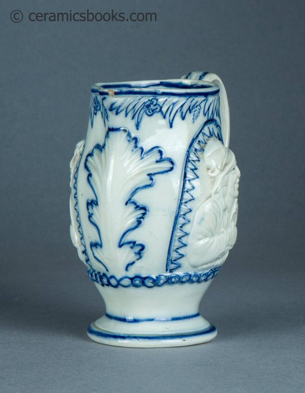 Pearlware jug, underglaze blue painted decoration. The Snuff Taker. c.1795-1815. AP/1388. Front obverse.