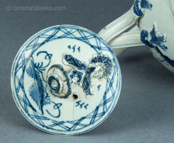 Pearlware teapot, painted blue underglaze Chinese House pattern. Attributed to Leeds Pottery. c.1780-1790. AP1401. Finial.