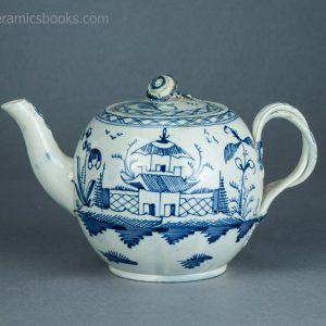 Pearlware teapot, painted blue underglaze Chinese House pattern. Attributed to Leeds Pottery. c.1780-1790. AP1401. Obverse.