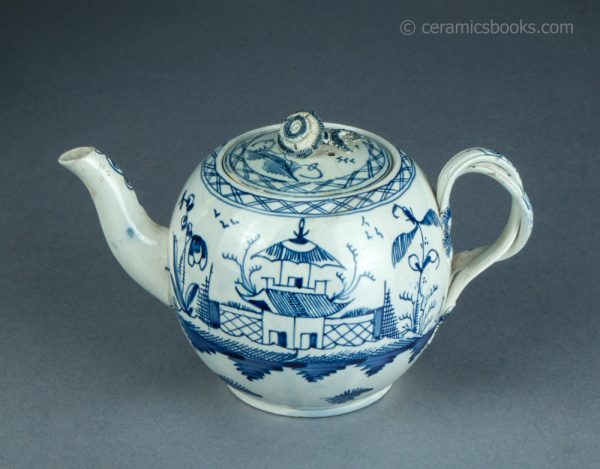 Pearlware teapot, painted blue underglaze Chinese House pattern. Attributed to Leeds Pottery. c.1780-1790. AP1401. Obverse above.