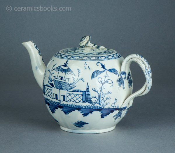 Pearlware teapot, painted blue underglaze Chinese House pattern. Attributed to Leeds Pottery. c.1780-1790. AP1401. Obverse back.