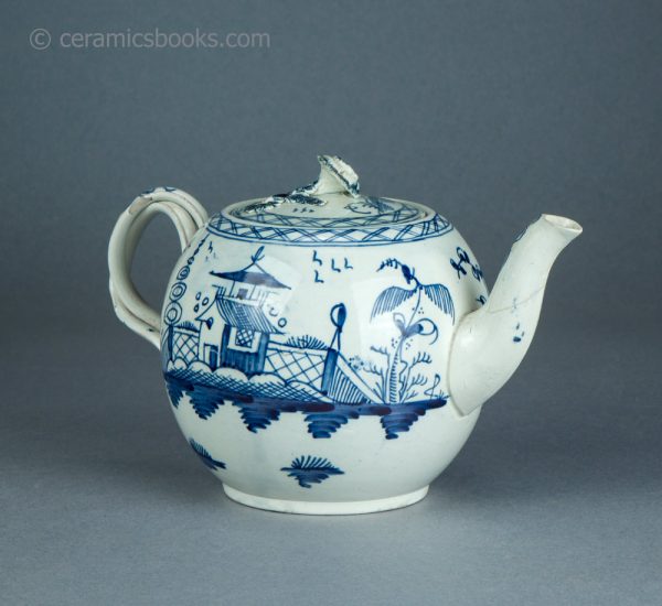 Pearlware teapot, painted blue underglaze Chinese House pattern. Attributed to Leeds Pottery. c.1780-1790. AP1401. Reverse front.