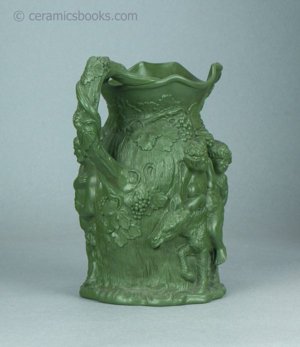 Green stoneware moulded jug. Drunken Silenus, Minton. c.1831-1840. AP/1452. Back reverse.