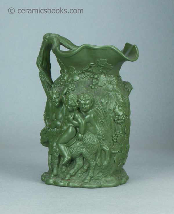 Green stoneware moulded jug. Drunken Silenus, Minton. c.1831-1840. AP/1452. Front reverse.