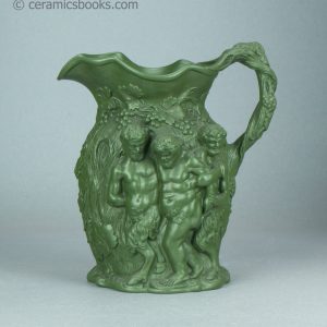 Green stoneware moulded jug. Drunken Silenus, Minton. c.1831-1840. AP/1452. Obverse.