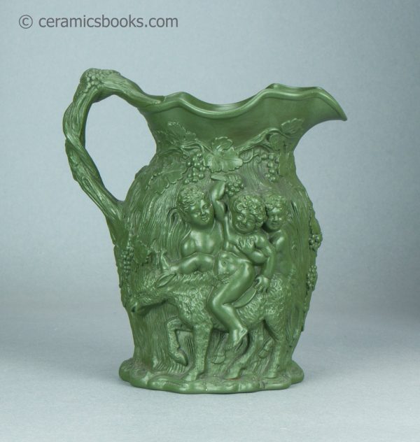Green stoneware moulded jug. Drunken Silenus, Minton. c.1831-1840. AP/1452. Reverse.