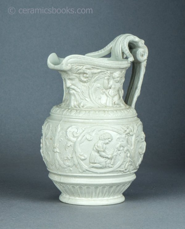 White stoneware moulded jug. 'Four Seasons' by Charles Meigh & Son. c.1852. AP/1454. Front obverse.