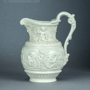 White stoneware moulded jug. 'Four Seasons' by Charles Meigh & Son. c.1852. AP/1454. Obverse.