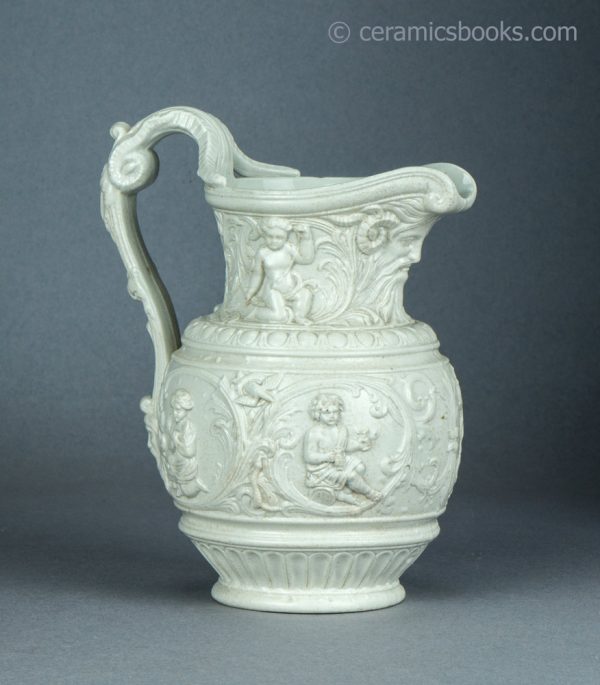 White stoneware moulded jug. 'Four Seasons' by Charles Meigh & Son. c.1852. AP/1454. Reverse angle.