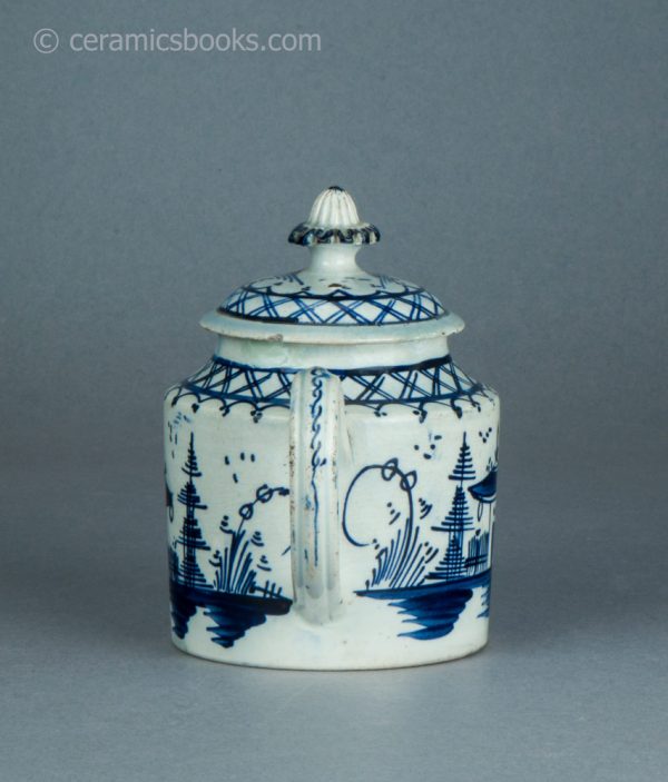 Pearlware cylindrical bachelor teapot with underglaze blue painted 'Chinese House' design. c.1785-1800. AP/1488. Back.