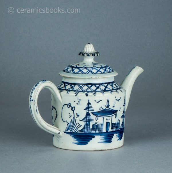 Pearlware cylindrical bachelor teapot with underglaze blue painted 'Chinese House' design. c.1785-1800. AP/1488. Back reverse.