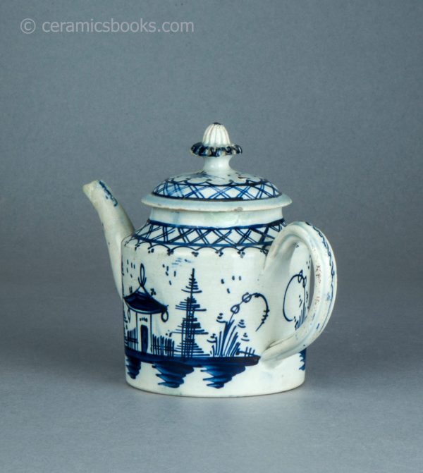Pearlware cylindrical bachelor teapot with underglaze blue painted 'Chinese House' design. c.1785-1800. AP/1488. Obverse back.